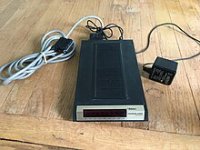 px-USRobotics_Courier_2400_Modem_with_serial_cable.jpg px-USRobotics_Courier_2400_Modem_with_serial_cable.jpg